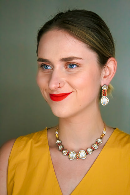 Charming Necklace in Saffron colour cord & Earrings set adorned with artificial rubies DURGA